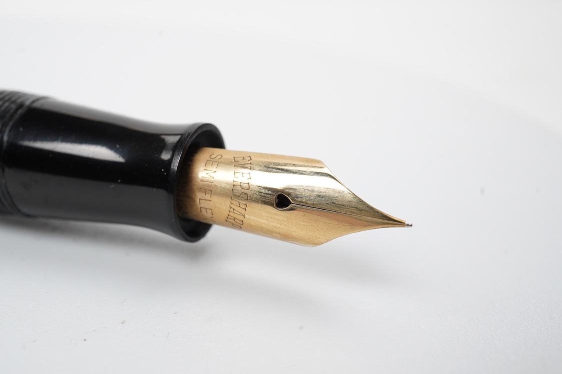 A Wahl Eversharp lever fill 'Doric' fountain pen in garnet colour with gold filled trim